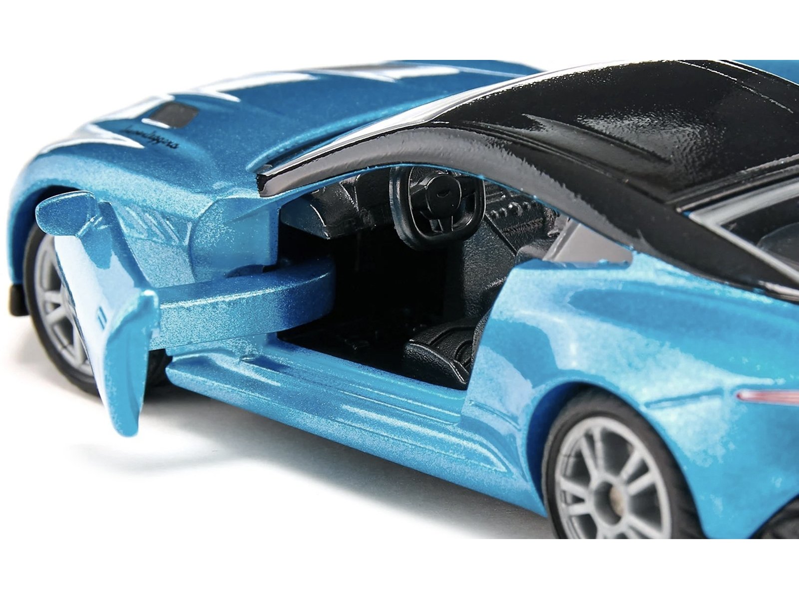 Aston Martin DBS Superleggera Blue Metallic with Black Top Diecast Model Car by Siku - Image 2