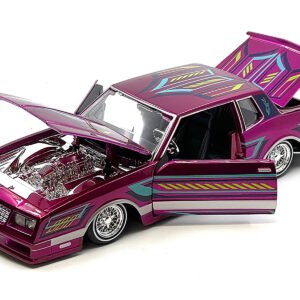 1986 Chevrolet Monte Carlo SS Lowrider Pink Metallic with Graphics "Lowriders" Series 1/24 Diecast Model Car by Maisto